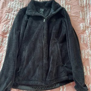 Black fuzzy north face jacket